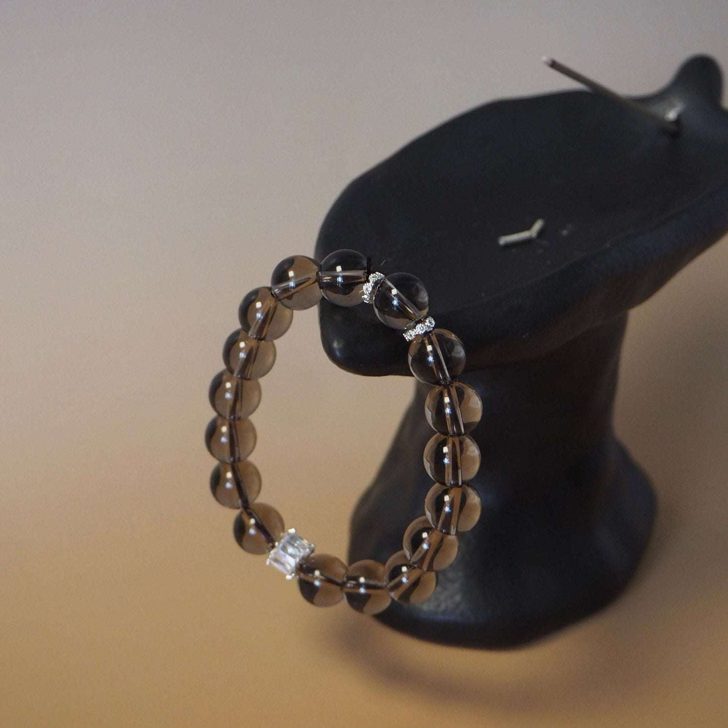 clarity smoky quartz chinese style bracelet in black table